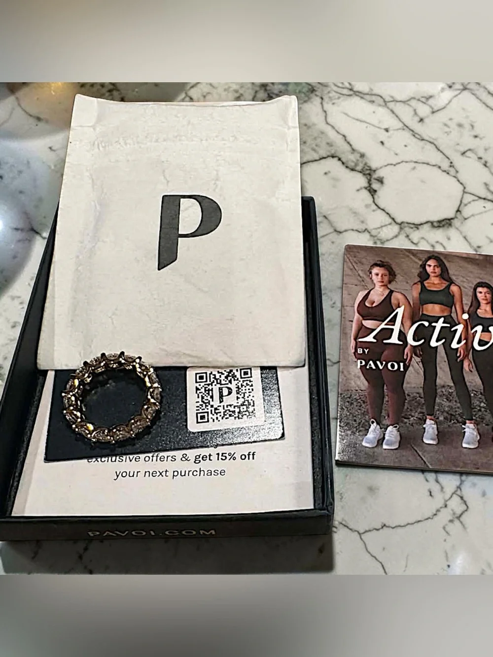 PAVOI Gold toned Eternity Ring with Clear Cubic Zirconia - Timeless Sparkle 5.5